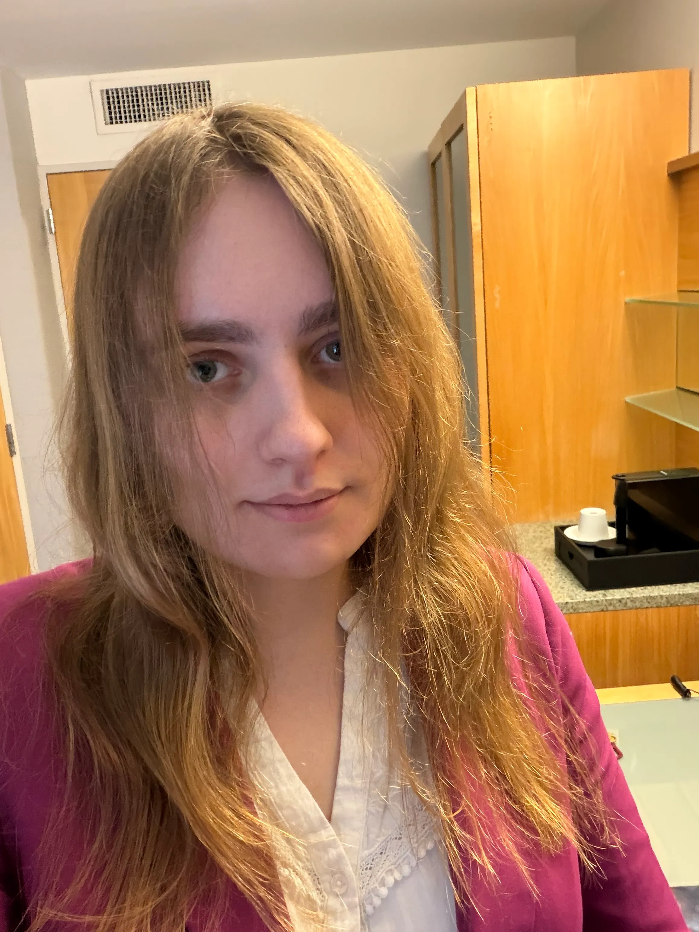 Amy in a hotel room in NYC